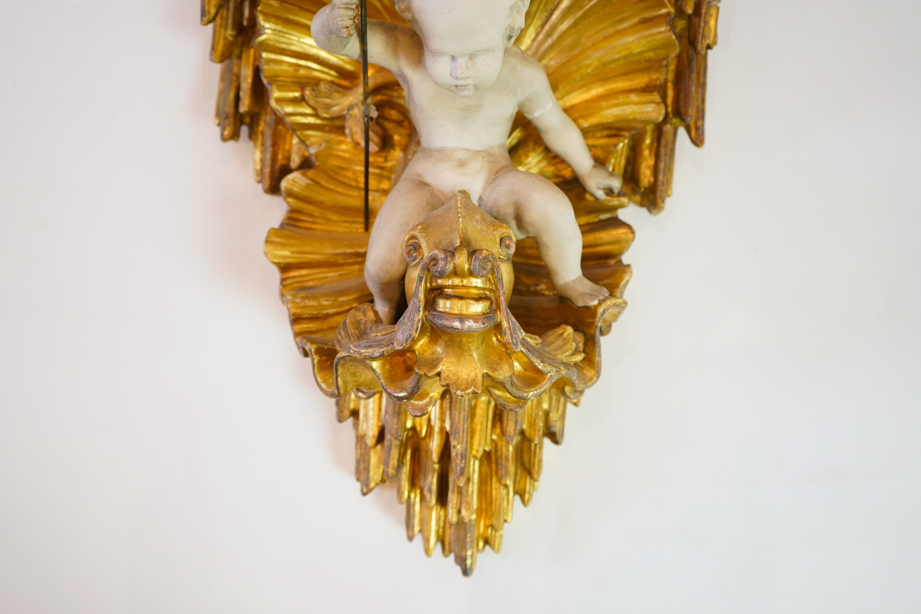 A late 18th / early 19th century carved and gilded wall bracket